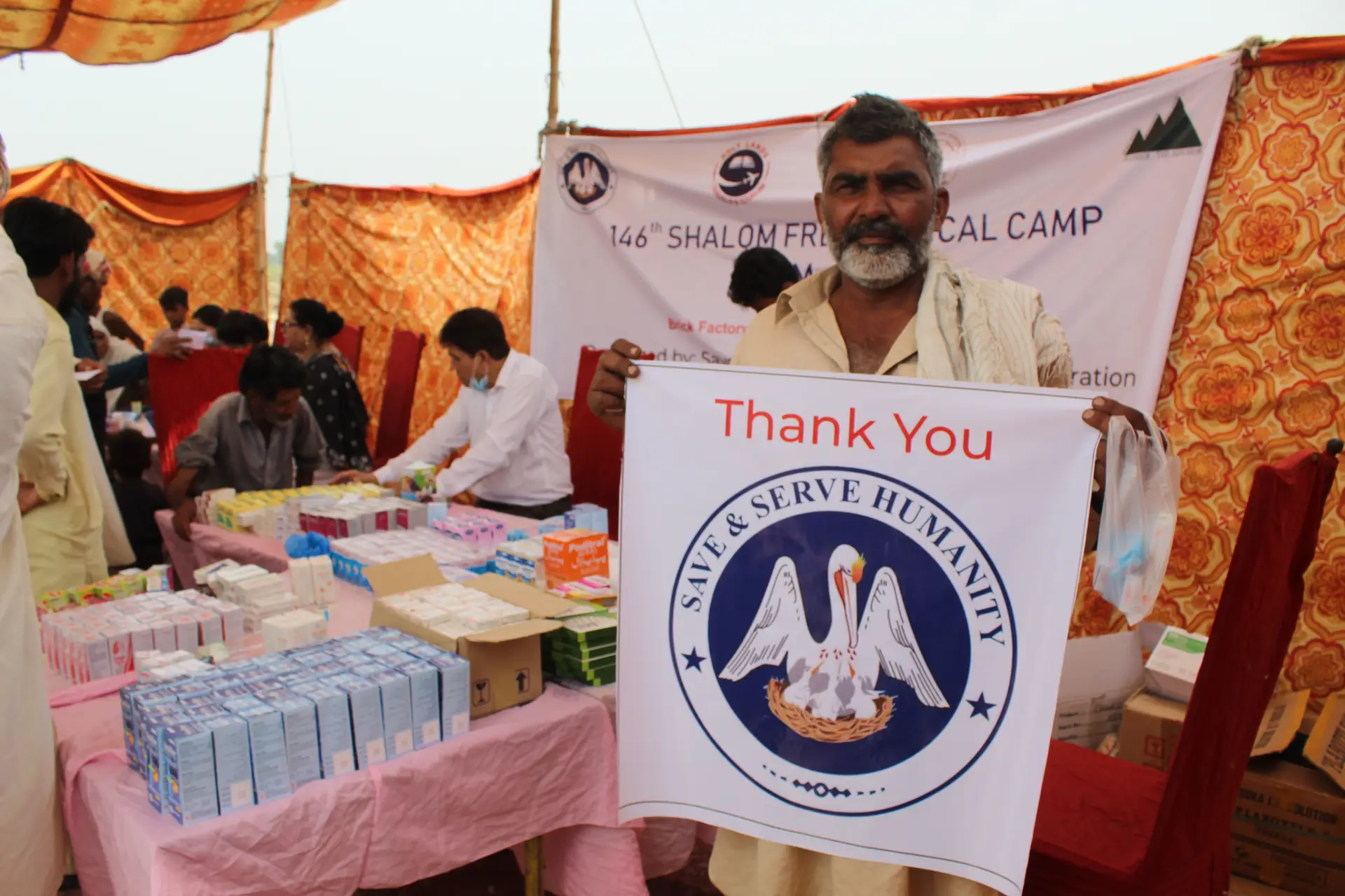People gathered during the brick-kiln medical camp.